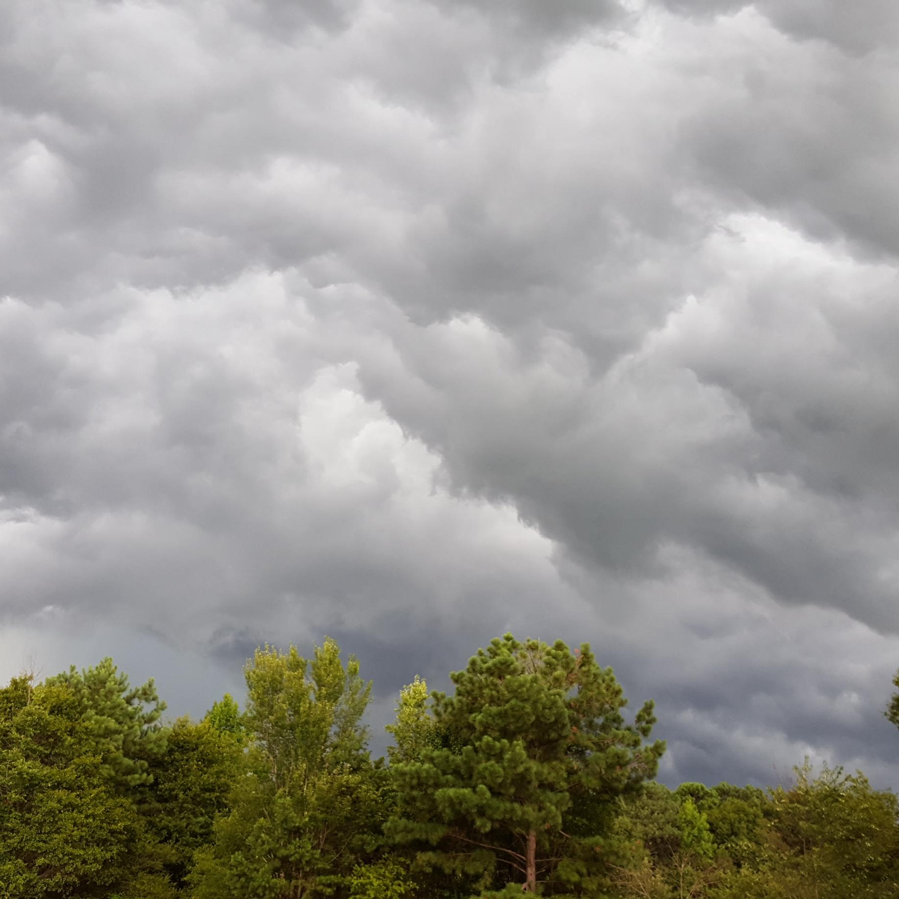 Clouds from a late afternoon July thunderstorm roll in over Georgia