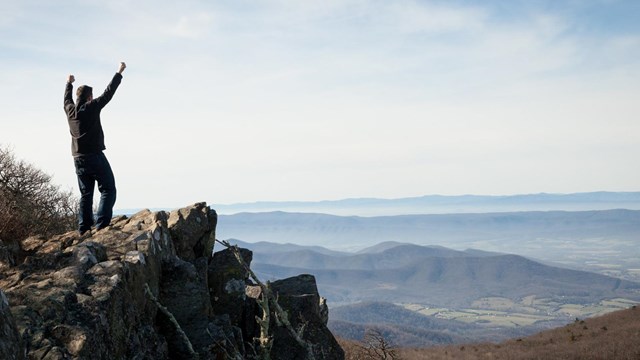 Hiker at Hawksbill Peak