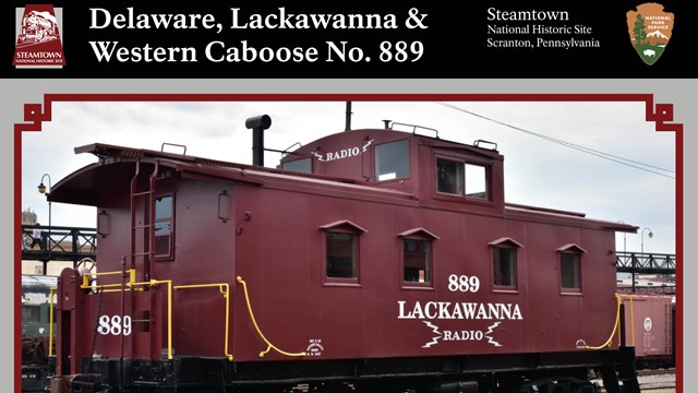 Front of a Trading Card with a color photo of a maroon caboose.  