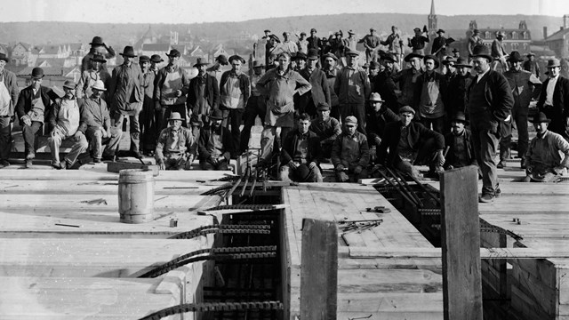 Construction workers, locomotive shop