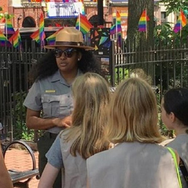 A park ranger speaking to a group of visitors.