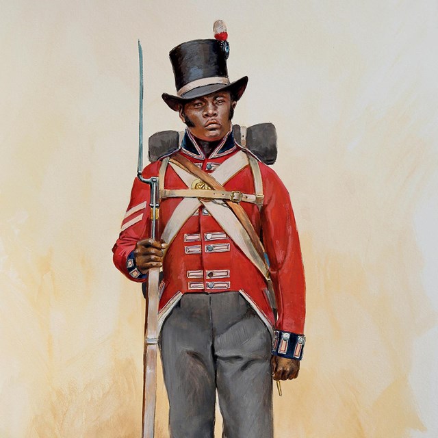 A Black man standing with a musket in a red British military coat.