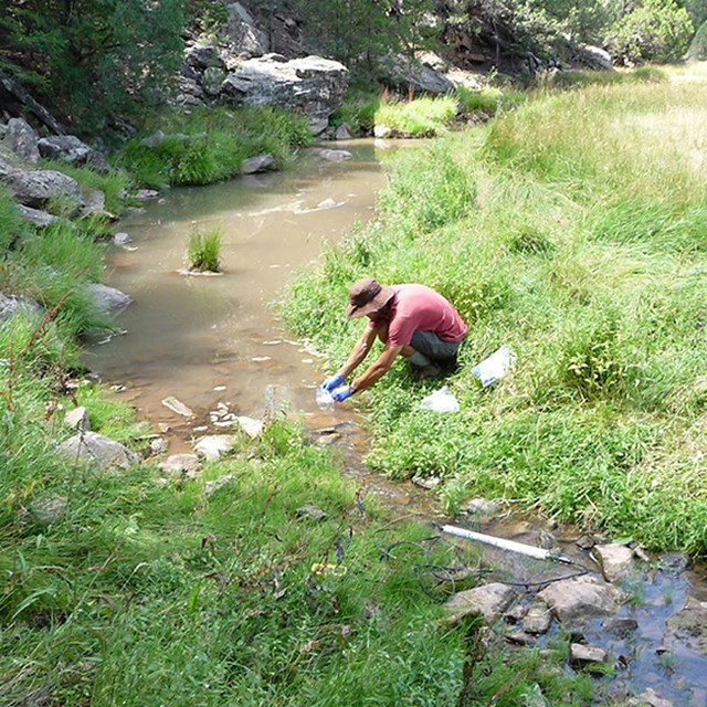 Collecting water quality data in Canyon de Chelly National Monument.