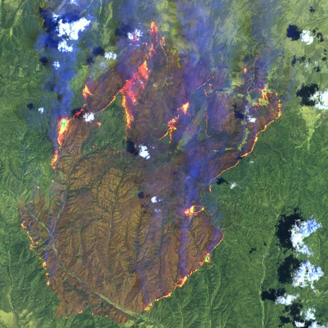 False color satellite image of wildfires burning in Arizona in 2002