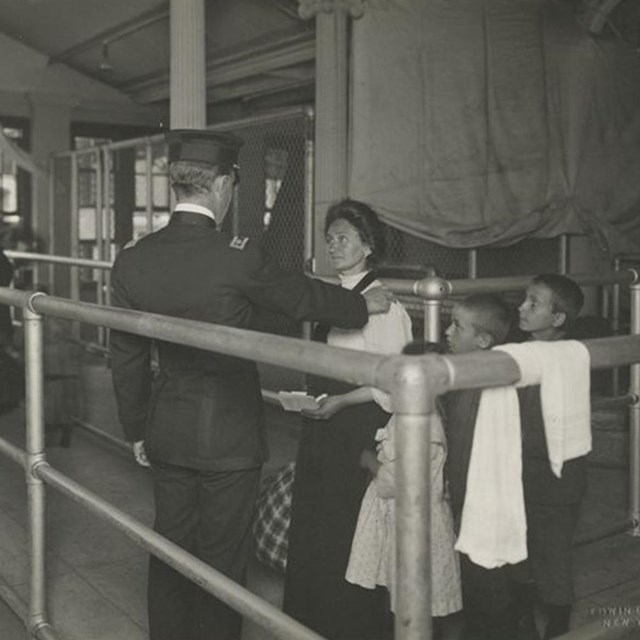 Immigrants at Ellis Island. Photo courtesy New York Public Library