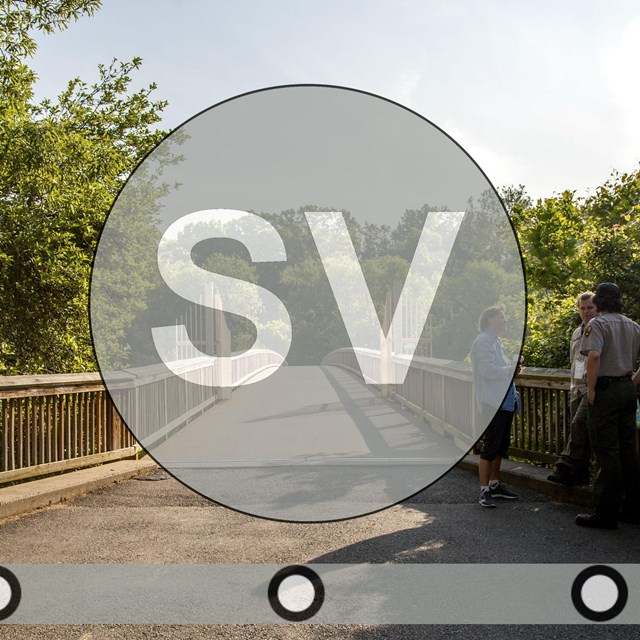 A Ranger answers a visitor question at Theodore Roosevelt Island.