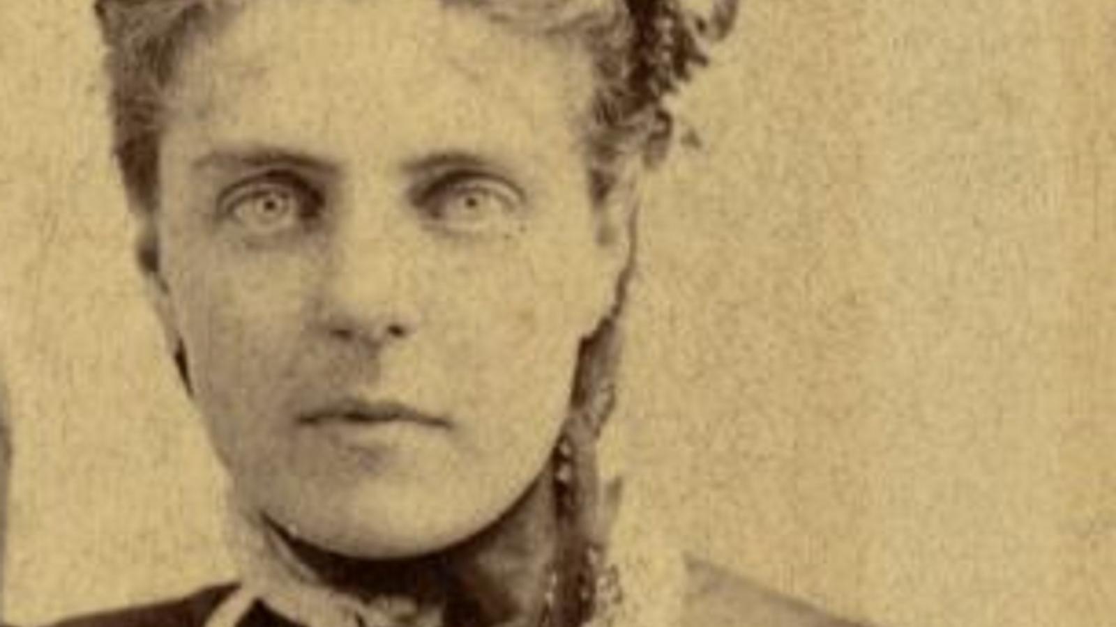 Sitting portrait of Anna Roosevelt wearing a dress, looking directly at viewer.