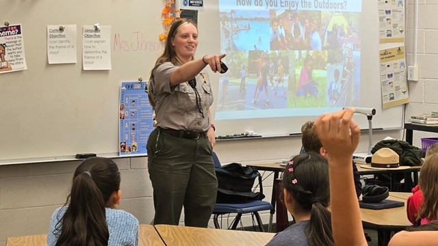 Ranger pointing at a student in a classroom