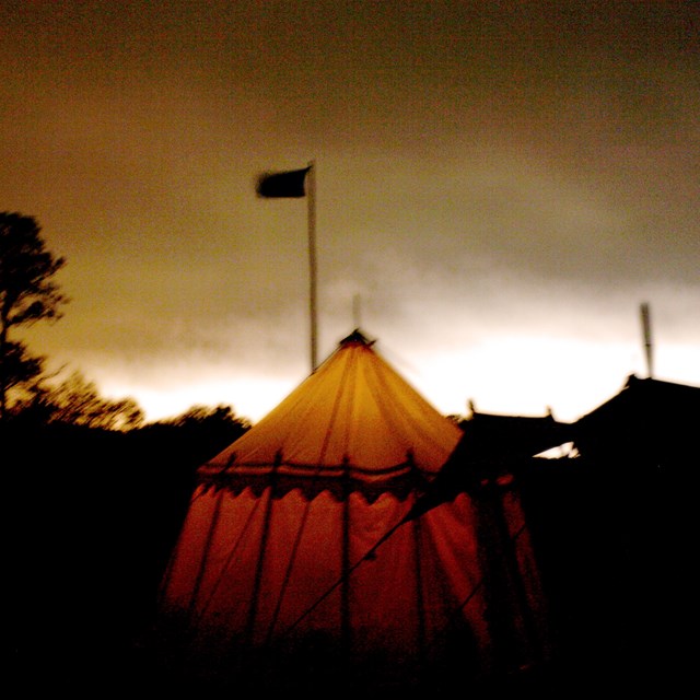 living history tent lit from inside