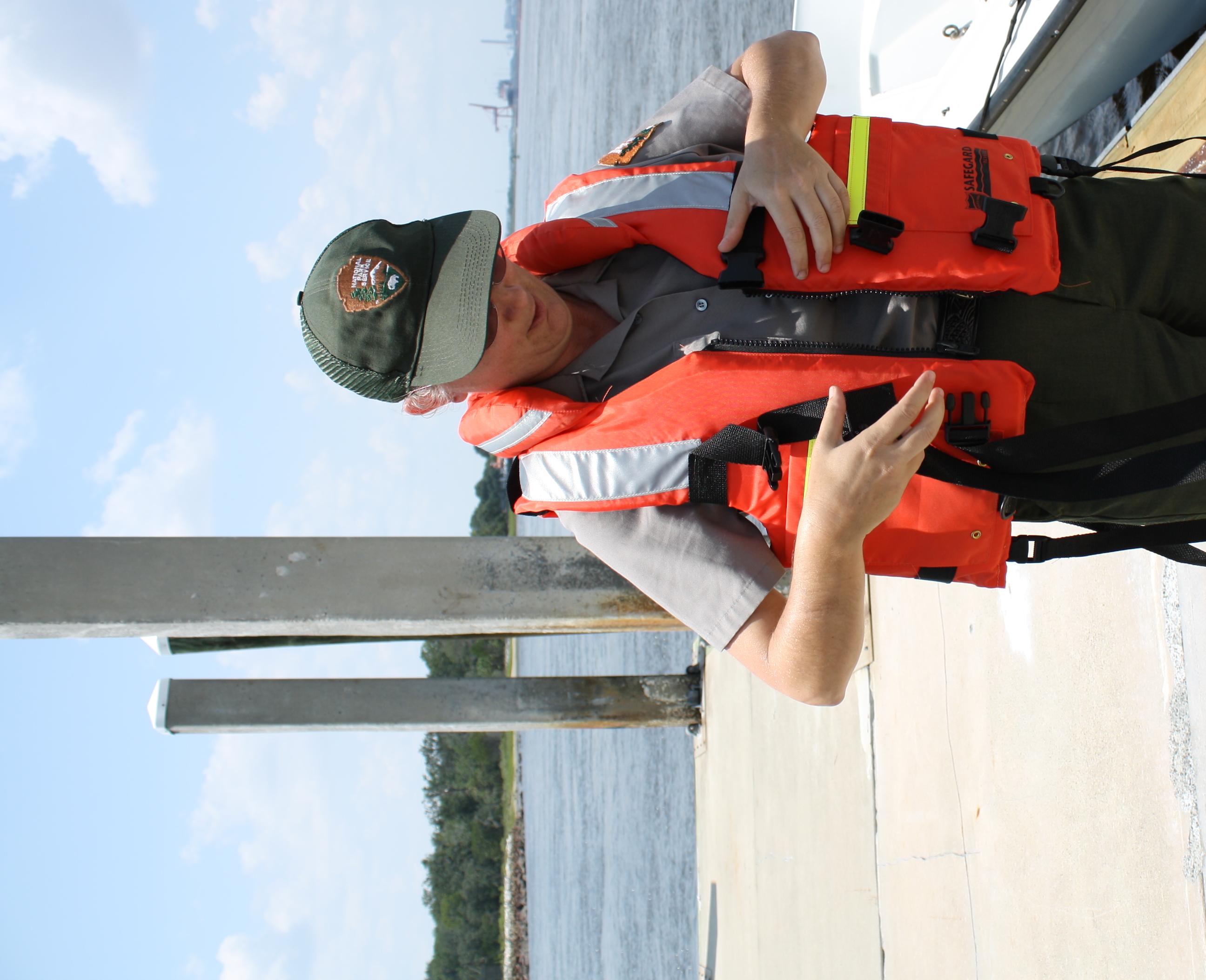ranger in orange life jacket