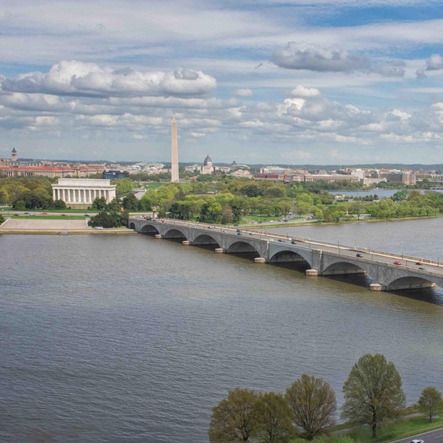 looking across river, bridge on right, washington monument in left background