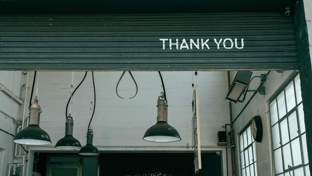'thank you' painted on a door