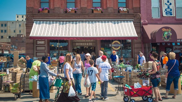 Photo of people at a market. 