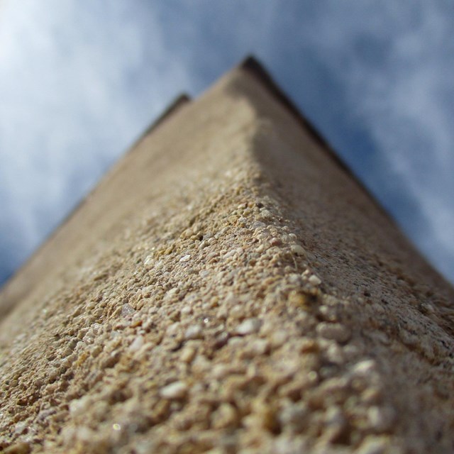 closeup of building corner, looking toward sky