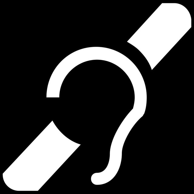 A black and white icon of an assistive listening device.