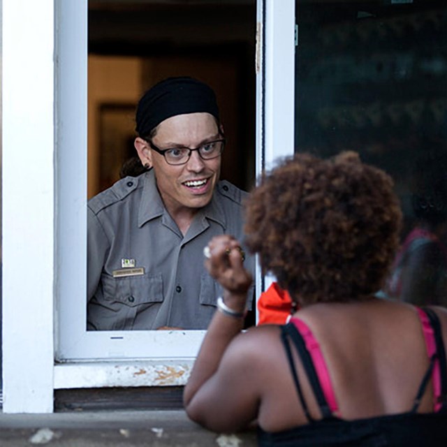 Ranger and Visitor speaking at ranger contact point