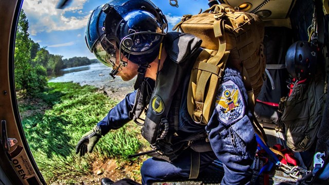 Police officer inside a helicopter