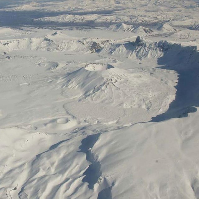 Photo of snow covered volcanic crater