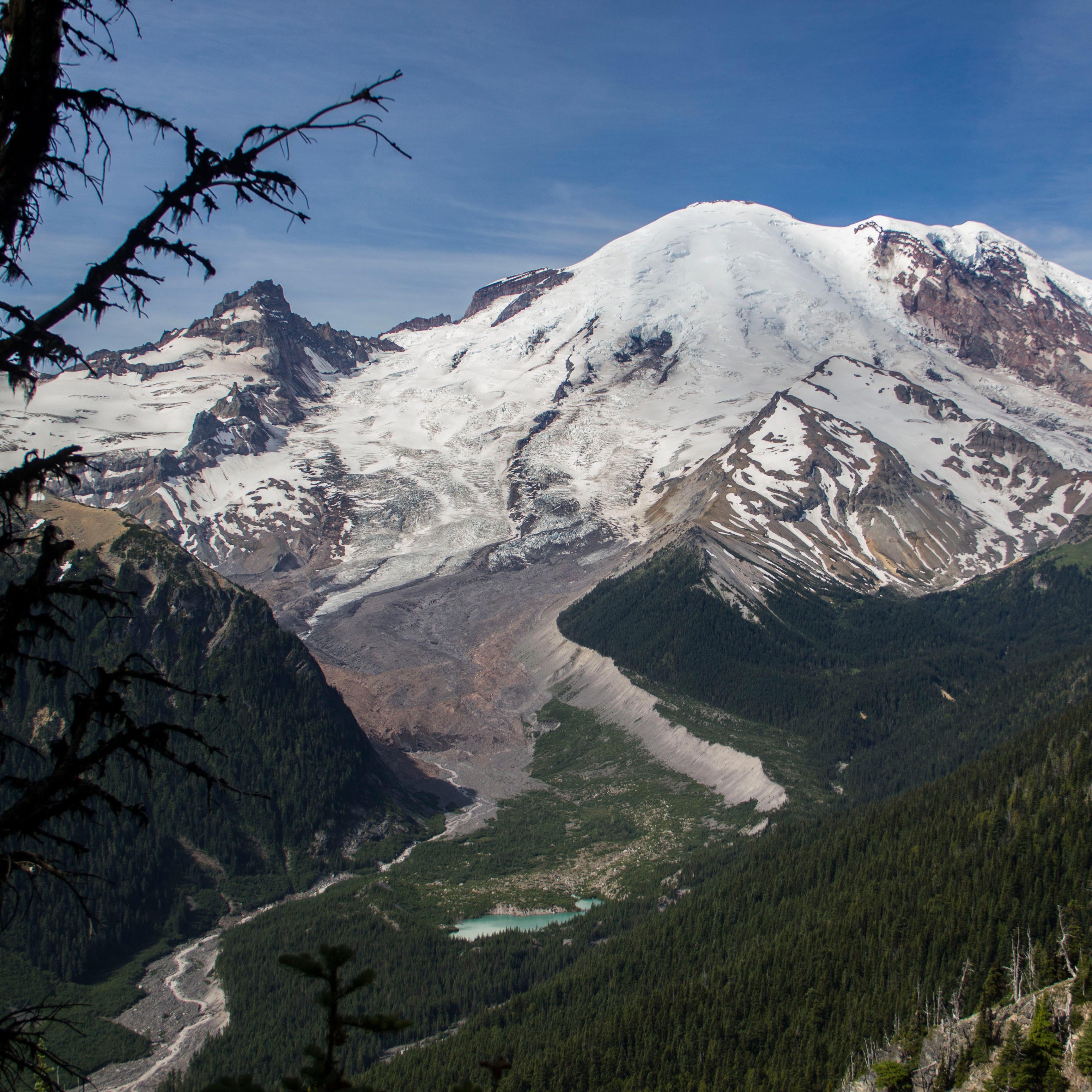 photo of a snow covered volcanic peak