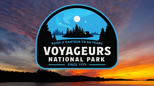 50th anniversary logo for Voyageurs National Park.