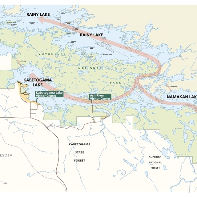 A map of Voyageurs National Park shows a series of blue lakes surrounded by green land. 
