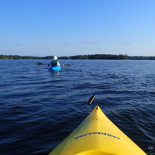 a person kayaking on the water