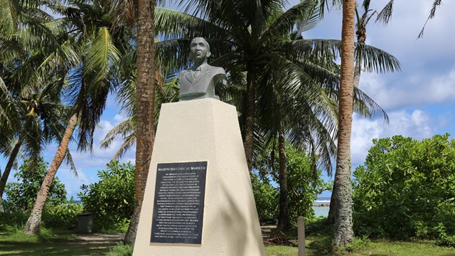 Obelisk with the bust of a man on top