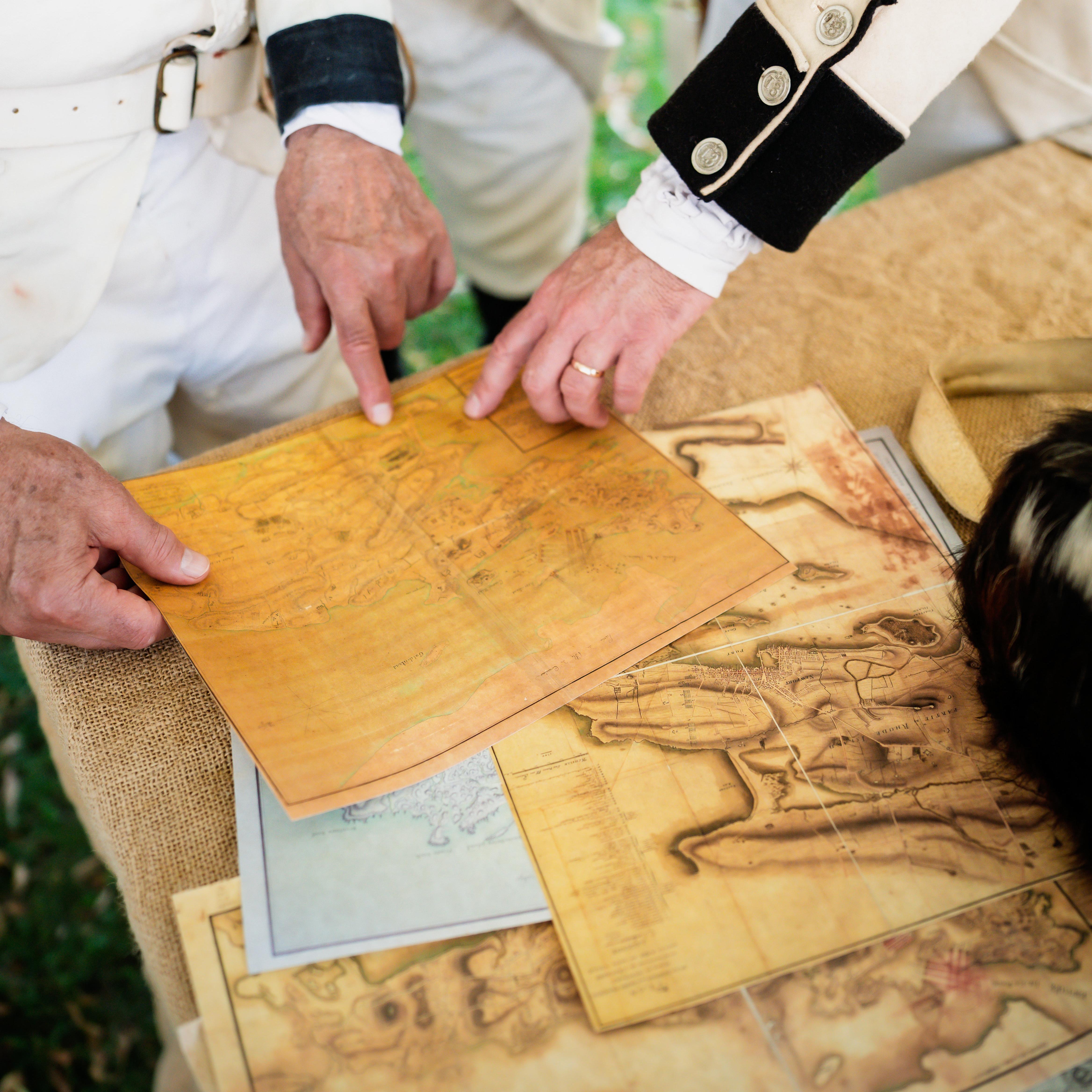 old maps on a table 