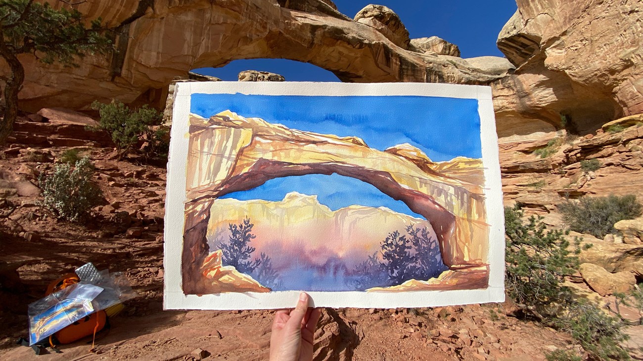 Painting of a sandstone arch in the recommended wilderness. Painted by Claire Giordano.