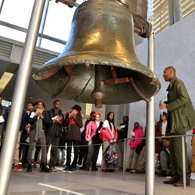 NPS ranger teaching students about Liberty Bell, NPS. 