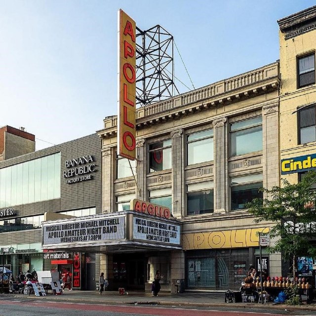 Exterior image of building with sign reading Apollo Theater
