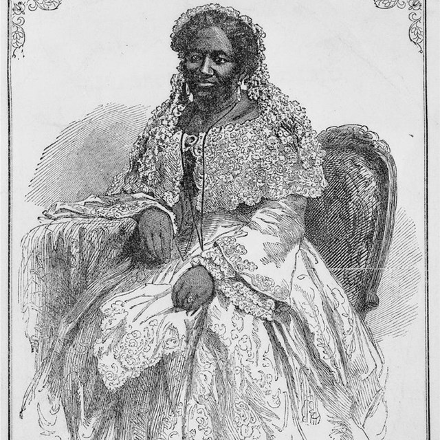 Drawing of woman seated in chair and wearing long dress and lacy shawl