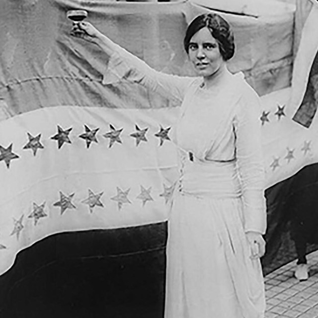 Alice Paul toasting the passage of the 19th Amendment. Library of Congress