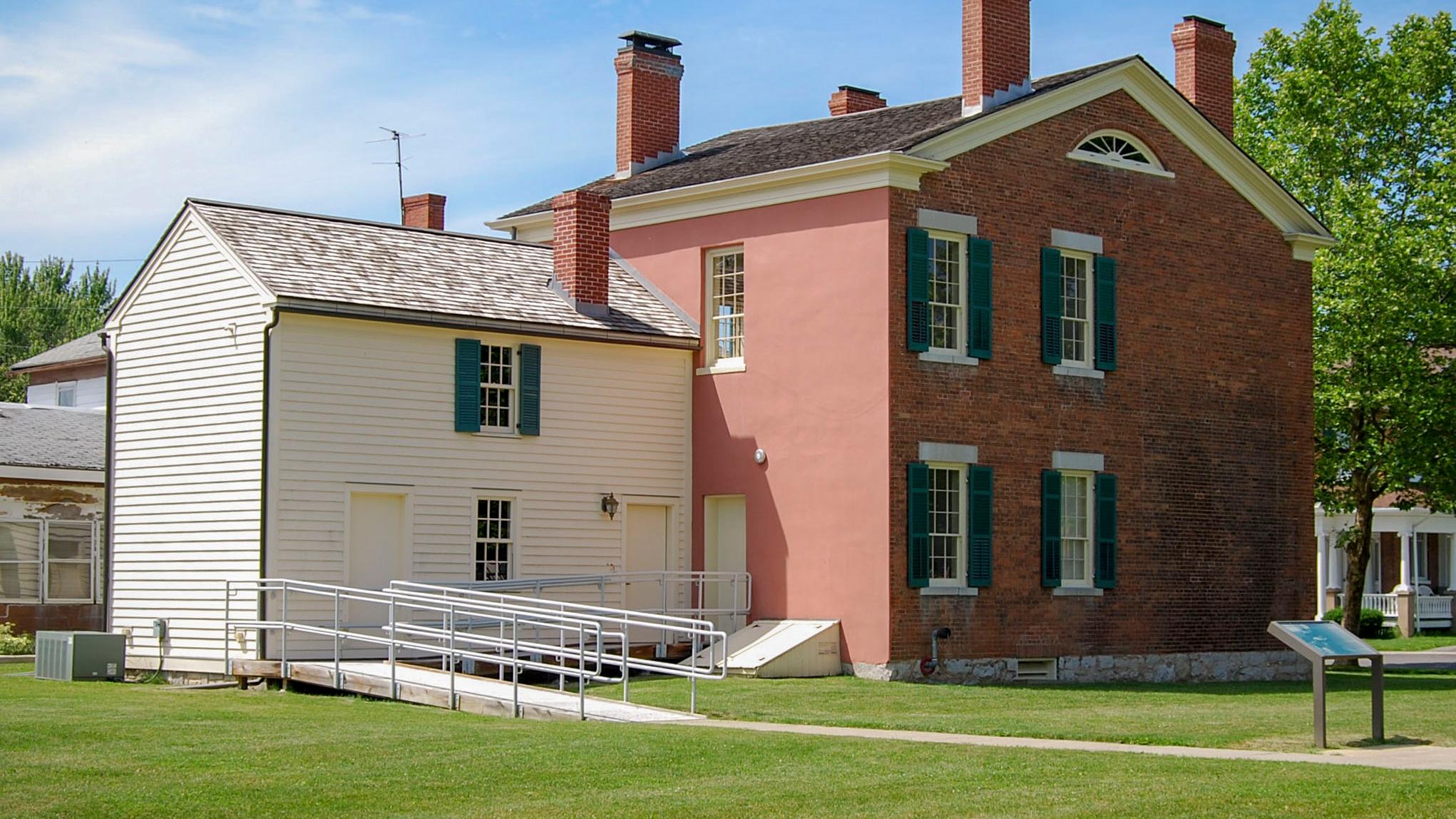 The back side of the M'Clintock House, showing a wheelchair-accessible ramp.