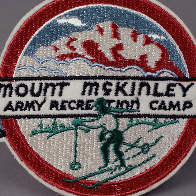a patch reading 'Mount McKinley Army Recreation Camp'