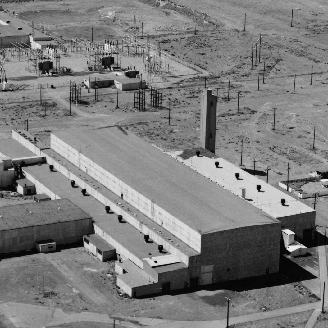 A B&W photo of a large, non-descript building.