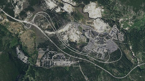 Satellite view showing the main roads and facilities around Old Faithful Geyser.