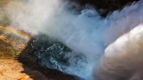Water flows over the Brink of Lower Falls in the Grand Canyon of the Yellwostone