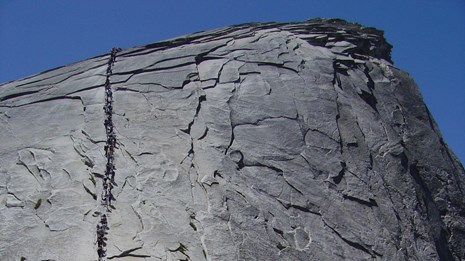 Hikers going up the Half Dome cables