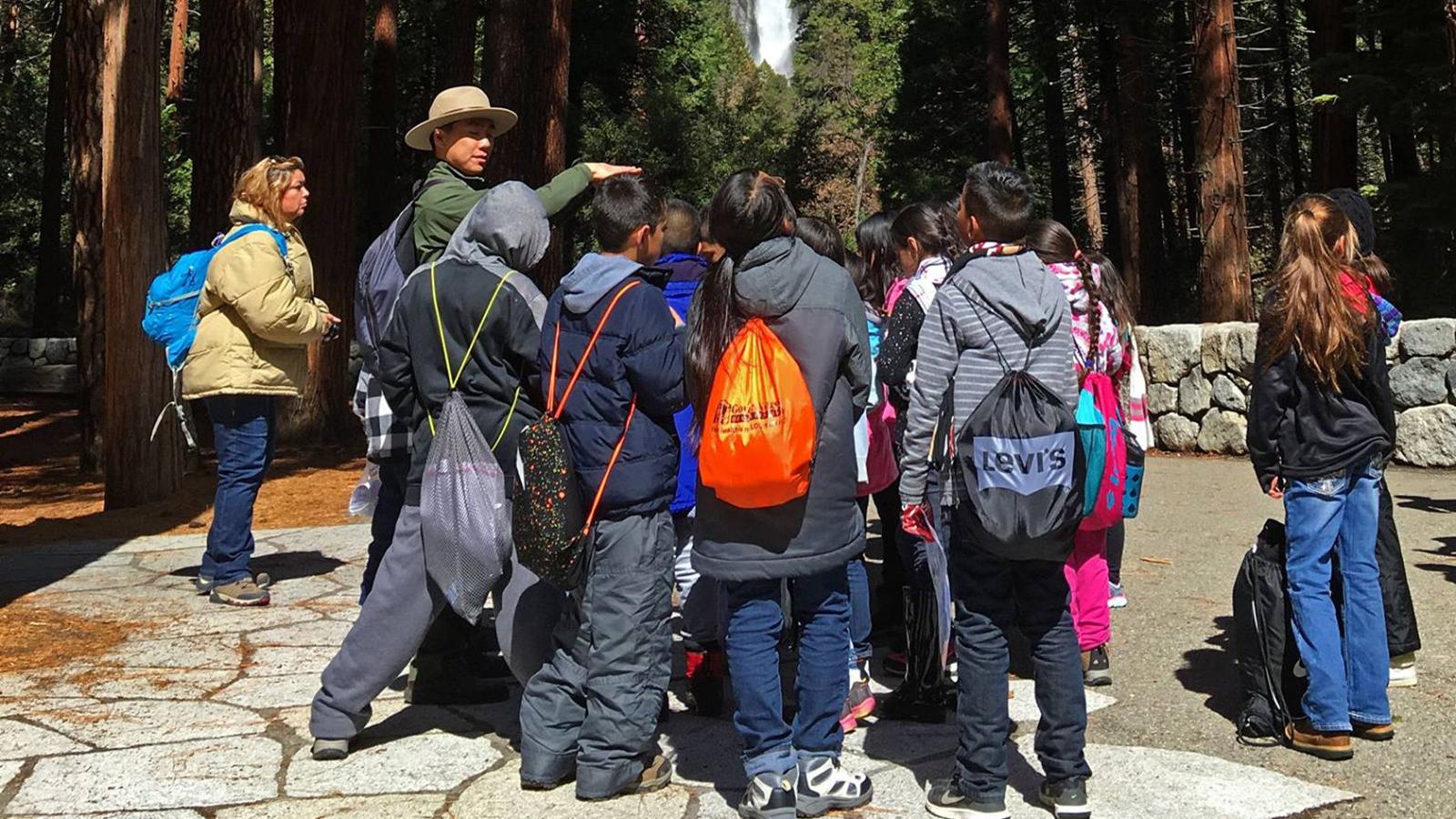 Ranger leading group of students to Lower Yosemite Fall