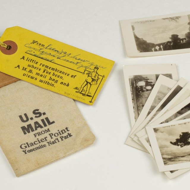 Souvenir postcard set, circa 1930 with miniature mail bag.