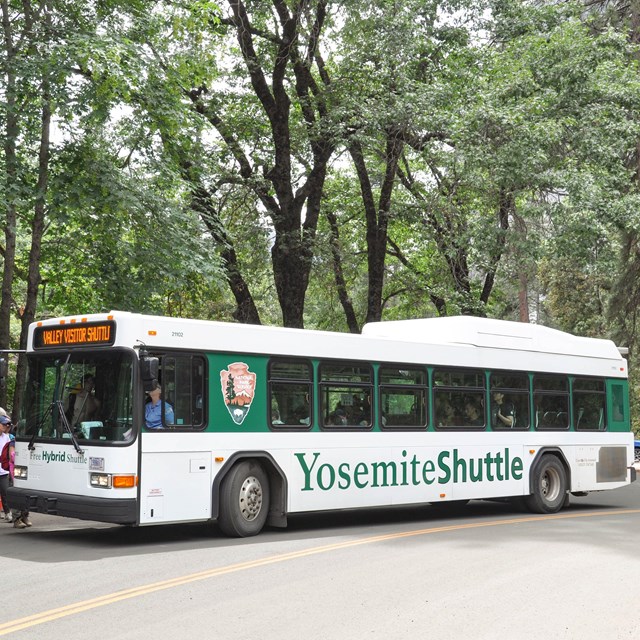 Shuttle bus at a stop in Yosemite Valley.