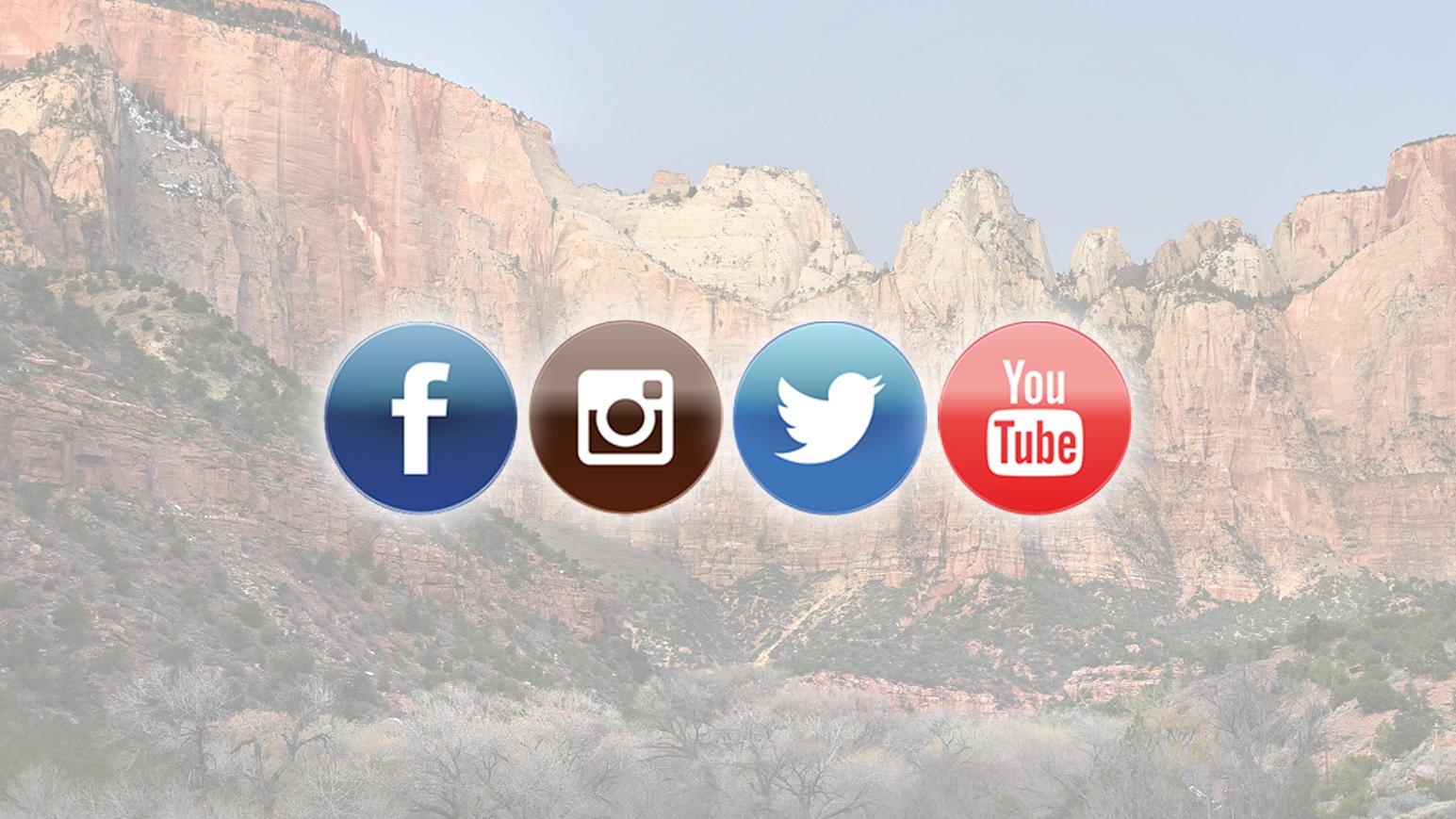 Logos for Facebook, Instagram, Twitter, and Youtube are seen with Zion Canyon in the background.