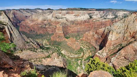 A winding canyon below a viewpoint.