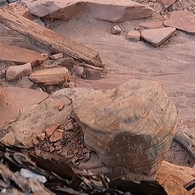 a large tan sandstone rock