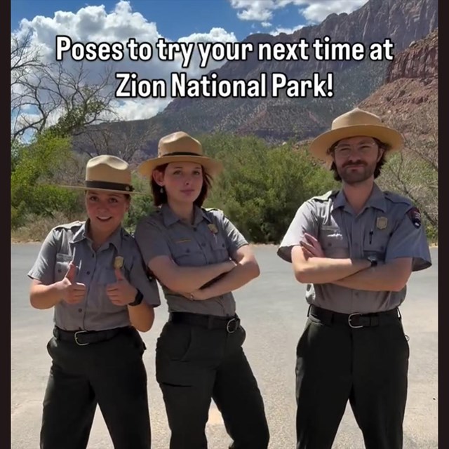 Three rangers stand with their arms cross.