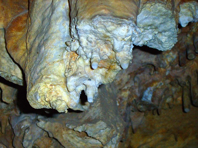 new calcium deposits on these stalactites forming in a cave