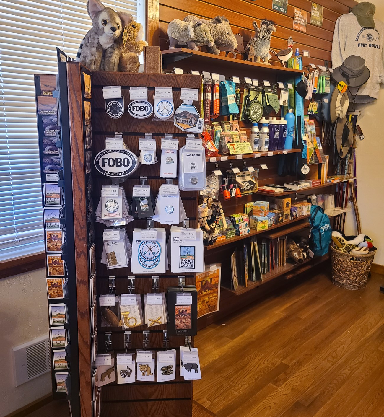 Store with collectibles, stickers, snacks, hats, and toys on the shelf.