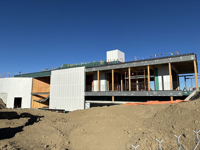 View of a wall of a building during construction. 