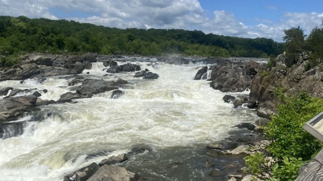 Rocky terrain with water rushing through during spring